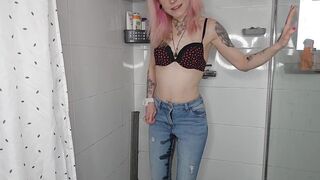 pink haired girl pisses her jeans and panties